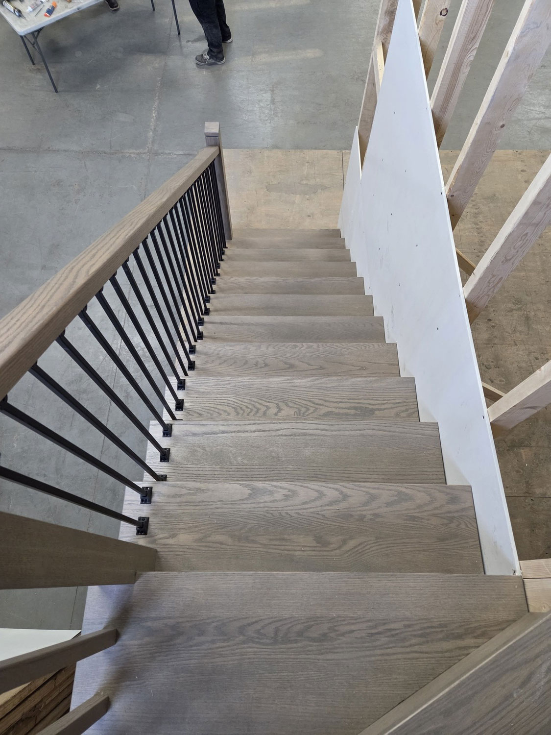 Stair rail and tread system installed during construction