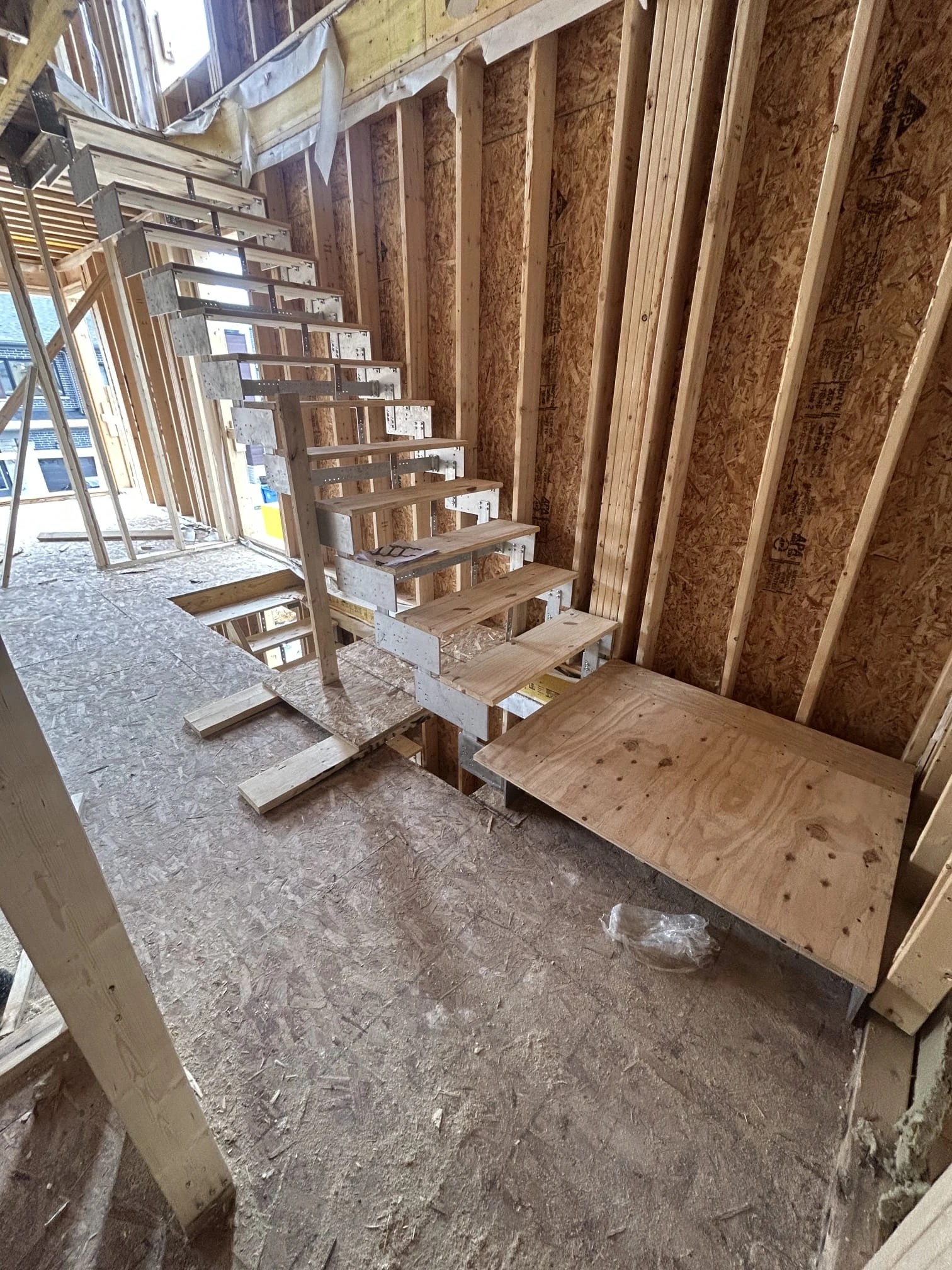 Engineered modular staircase within a completed interior